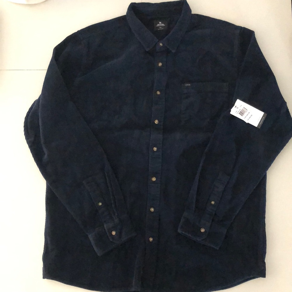 Navy blue Men’s Rip Curl corduroy long sleeve button up.